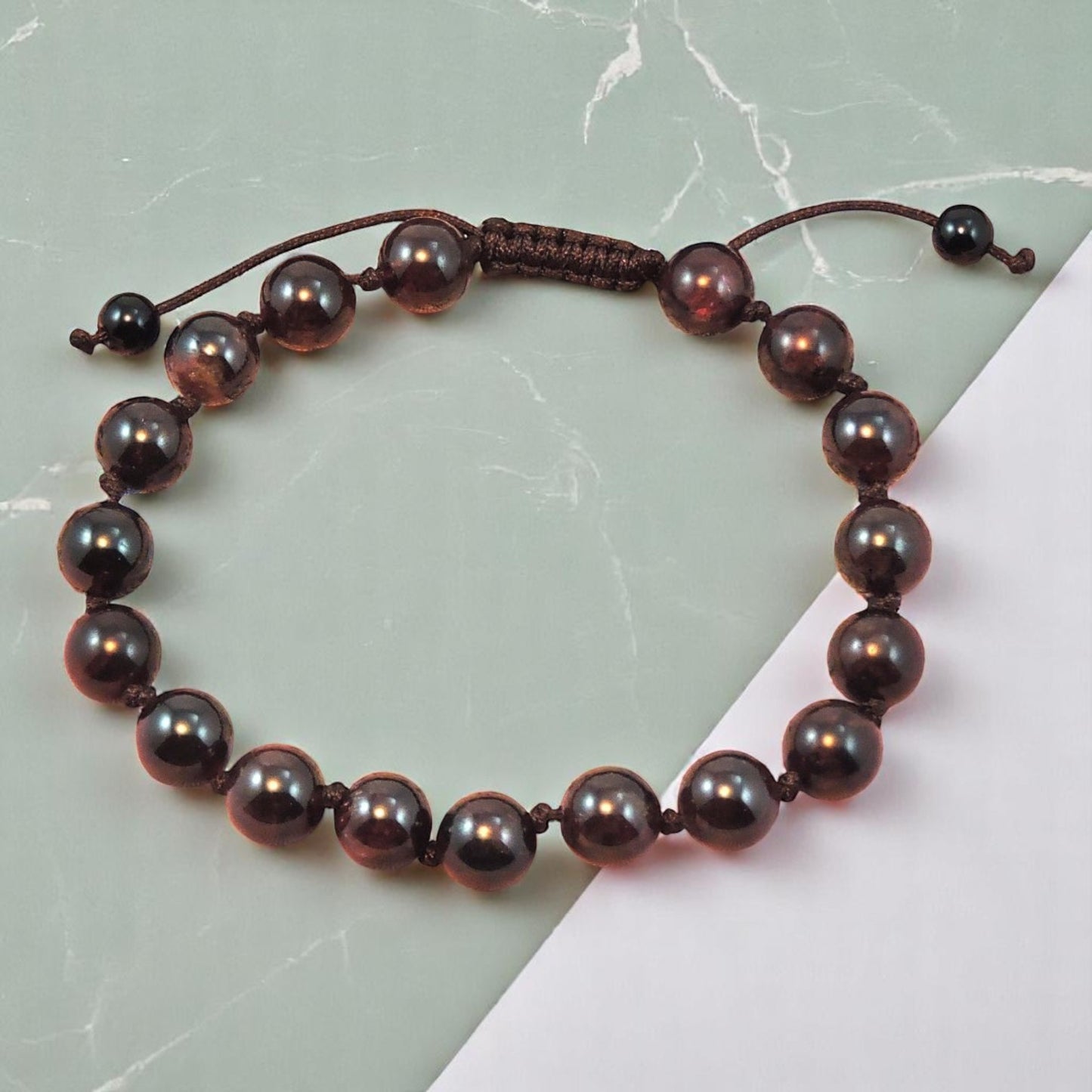 Tibetan individually knotted adjustable wrist mala bracelet Garnet brown cord