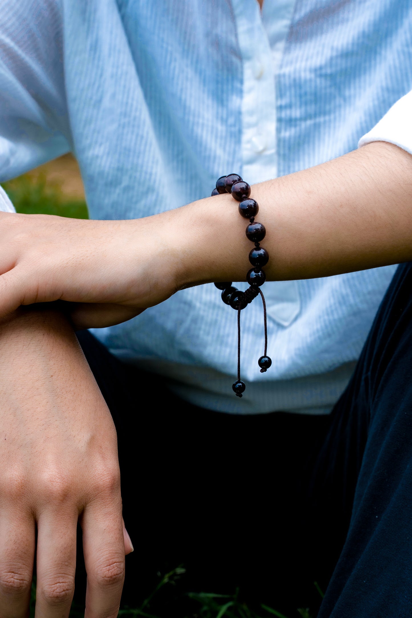 Tibetan individually knotted adjustable wrist mala bracelet Garnet brown cord