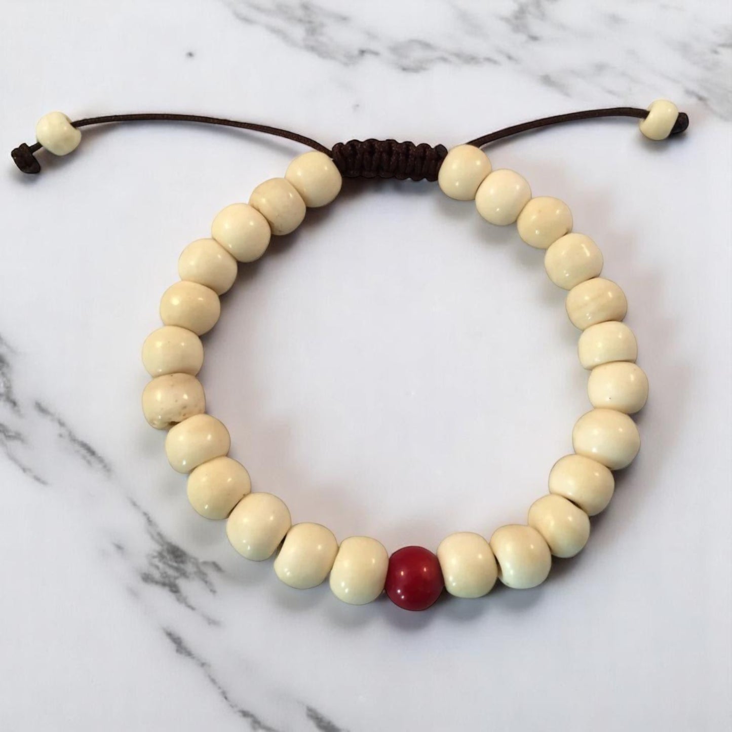 Yak Bone Wrist Mala Bracelet with Coral Spacer