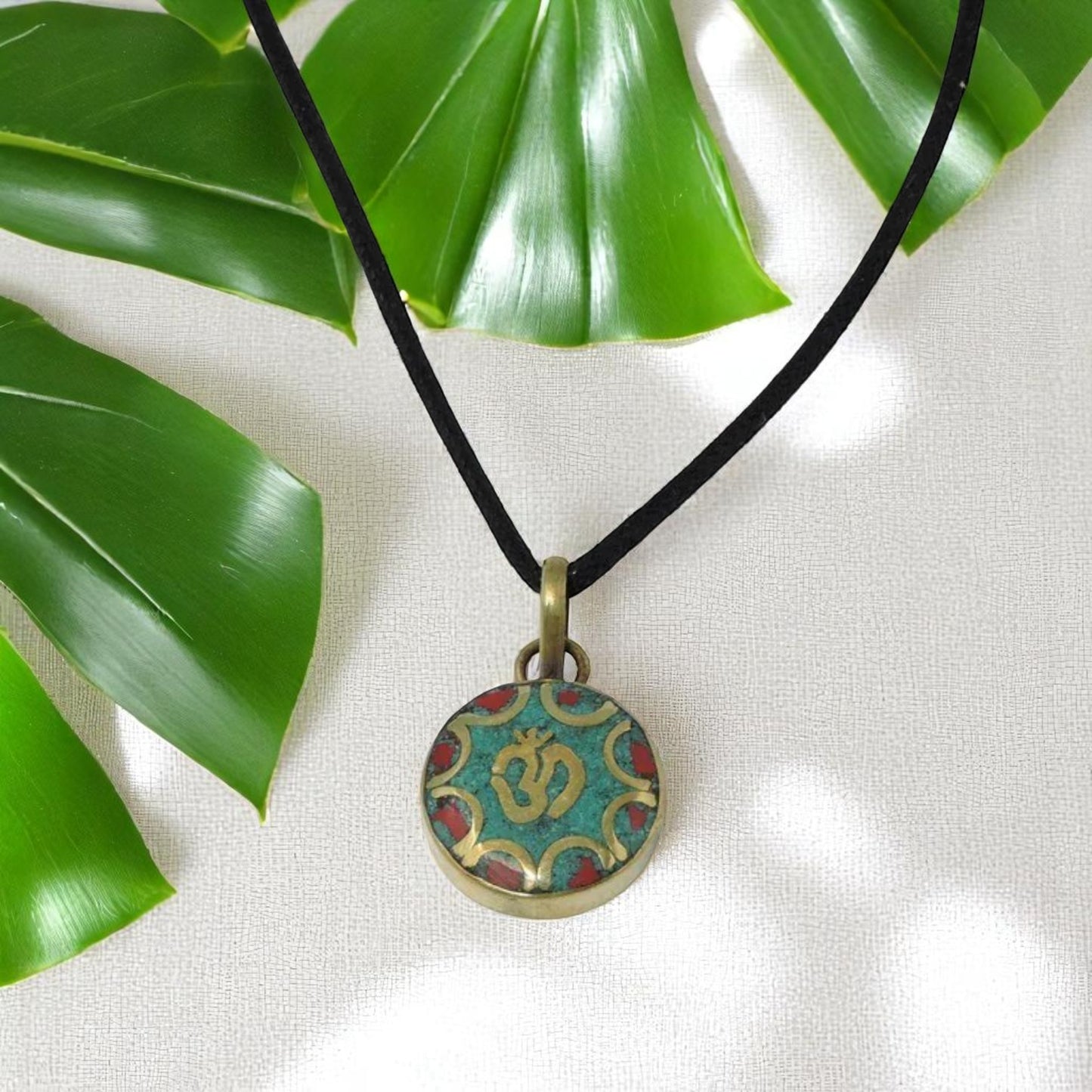 Handmade Turquoise and Coral Inlaid Brass Sanskrit Om Pendant (Round)
