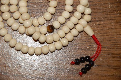 Yak bone mala with tiger eye spacers