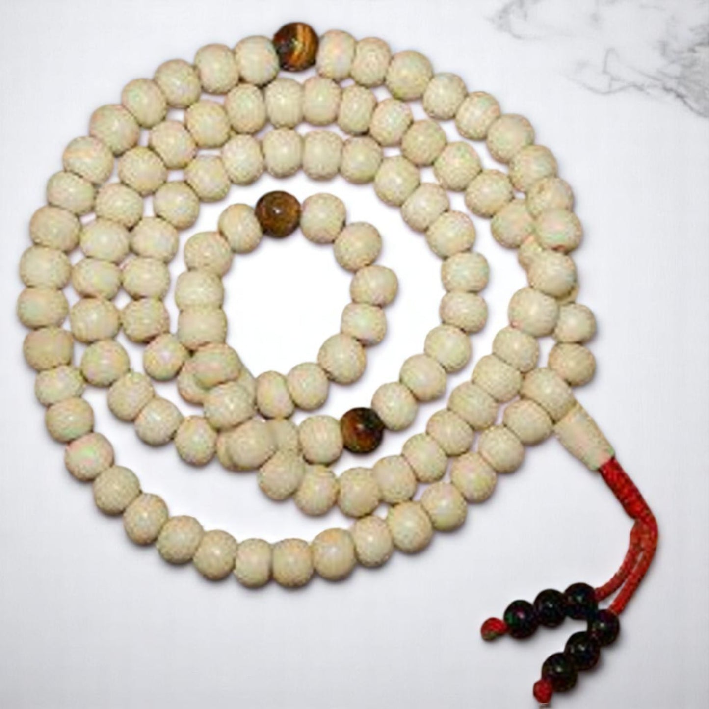Yak bone mala with tiger eye spacers