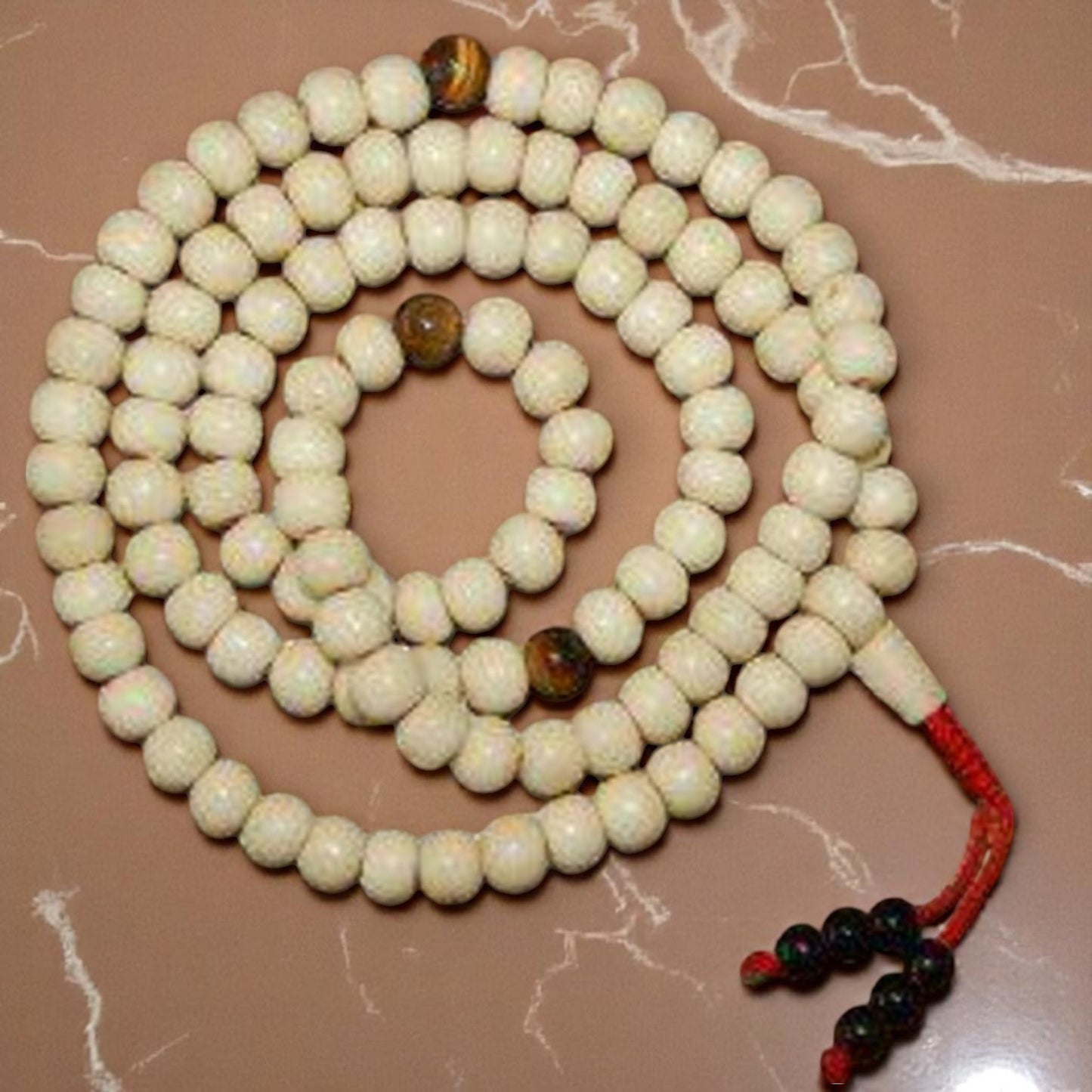 Yak bone mala with tiger eye spacers