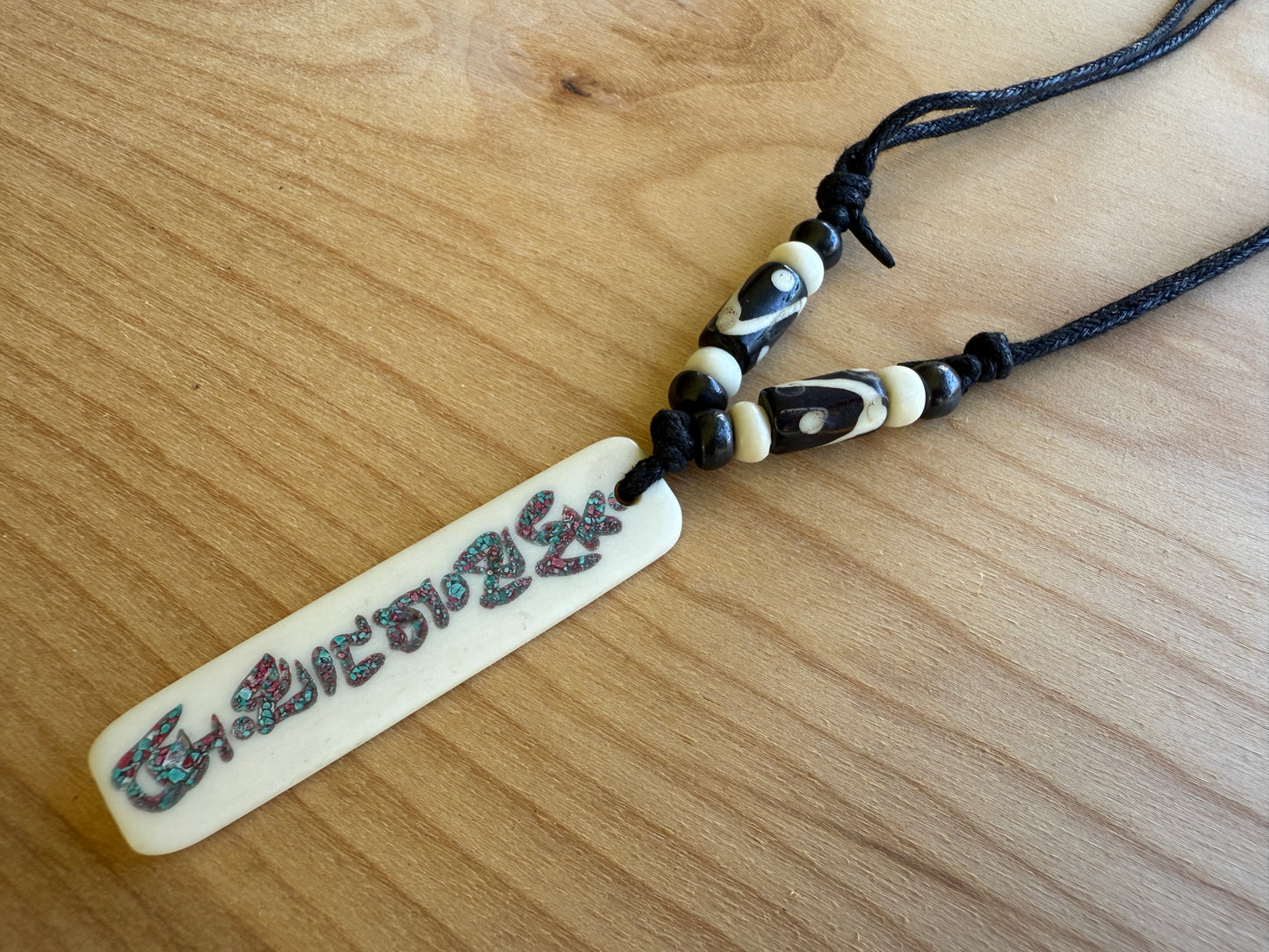 Buddha of Compassion Yak Bone Om Mani Pendant From Nepal