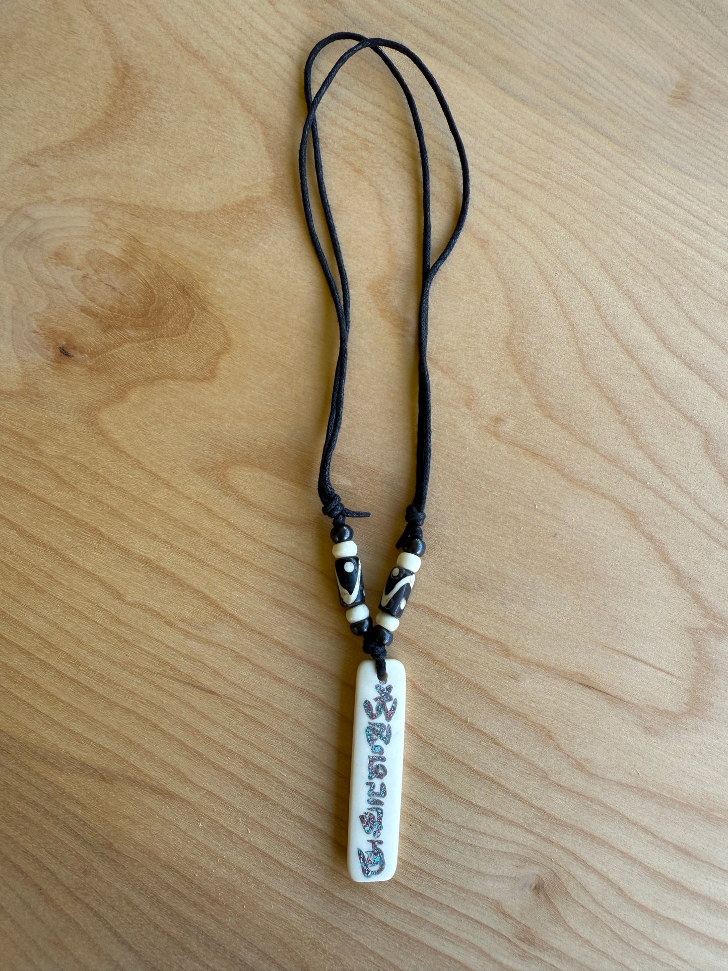 Buddha of Compassion Yak Bone Om Mani Pendant From Nepal