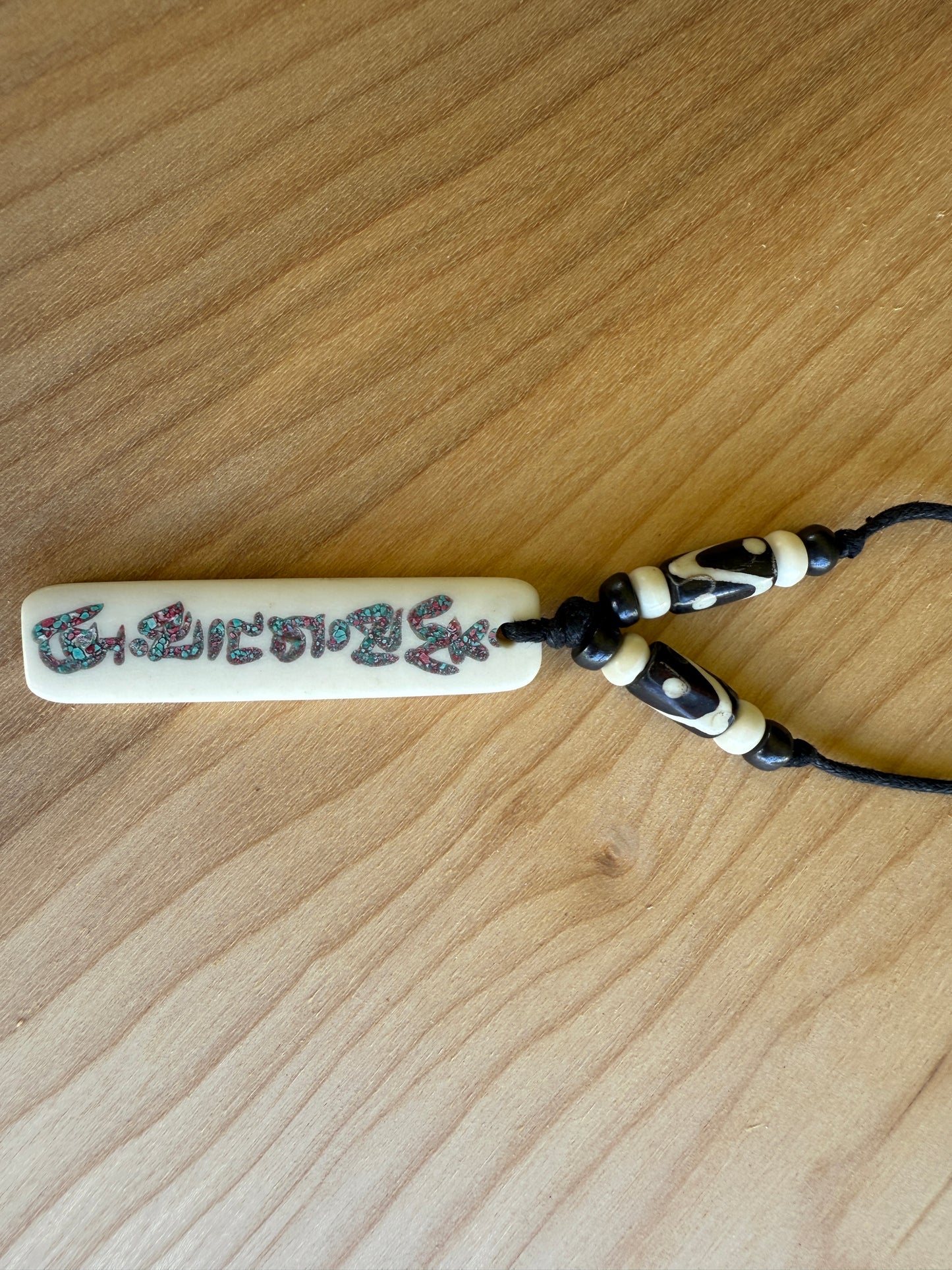Buddha of Compassion Yak Bone Om Mani Pendant From Nepal