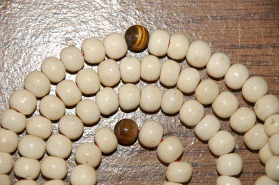 Yak bone mala with tiger eye spacers