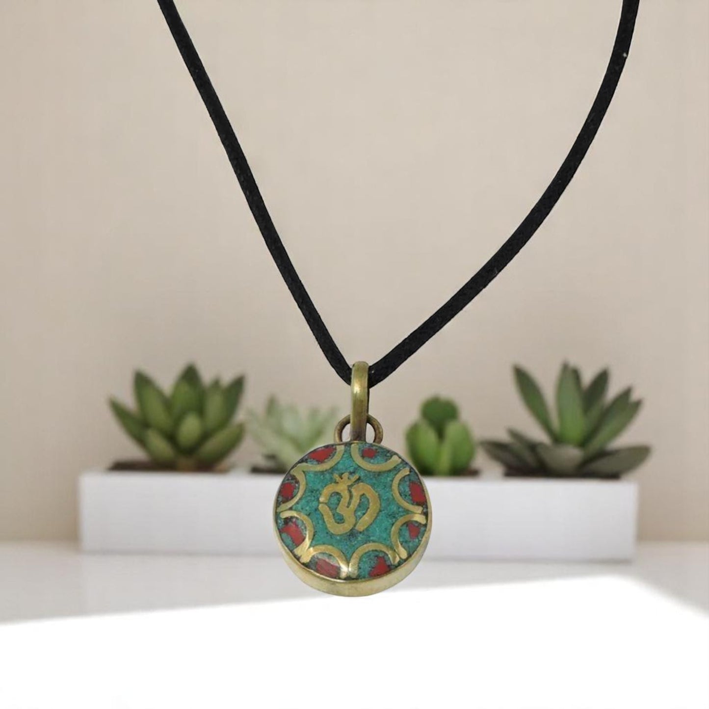 Handmade Turquoise and Coral Inlaid Brass Sanskrit Om Pendant (Round)