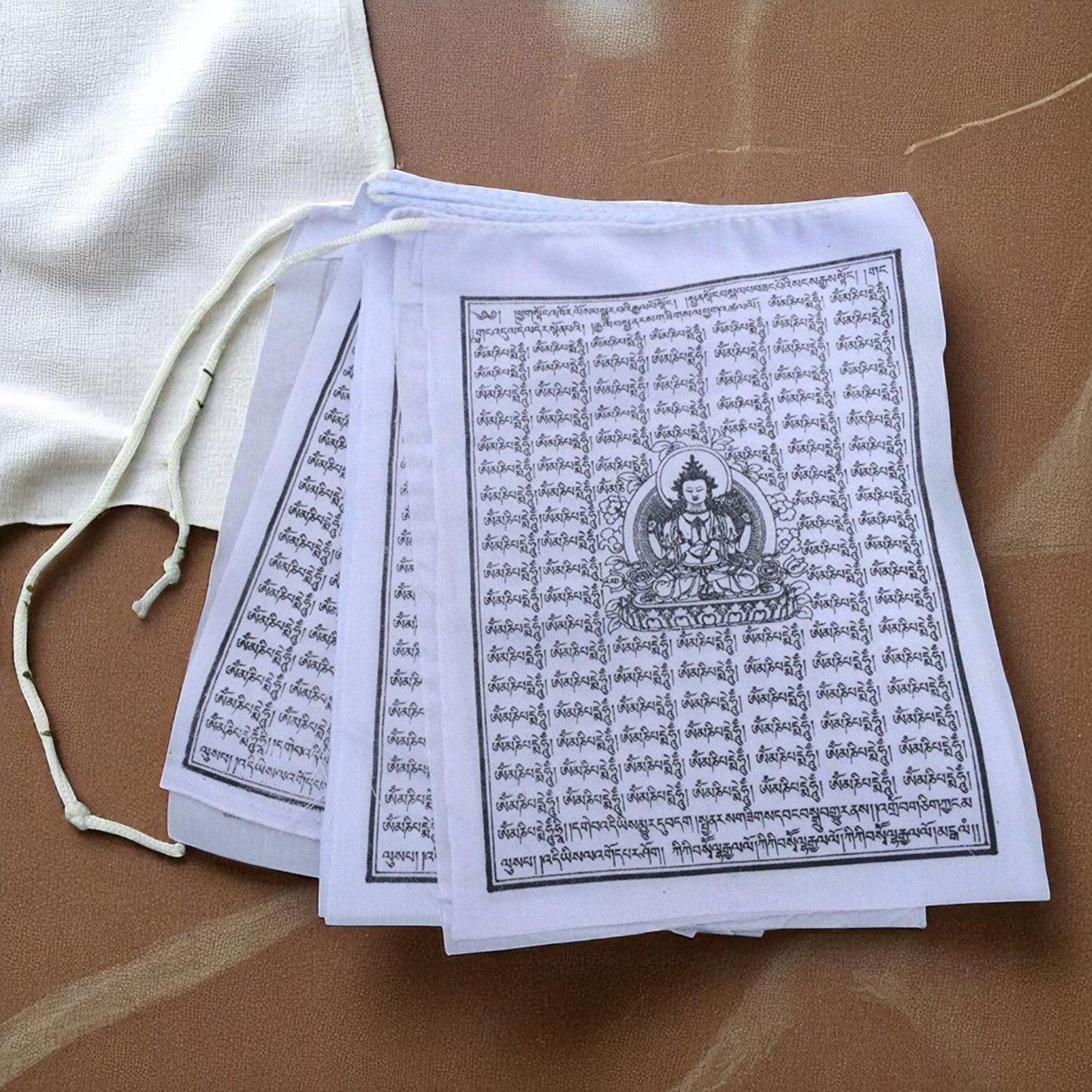 Buddha of Compassion Tibetan Prayer Flags From Nepal - Solid White Color (Set of 10 Flags)