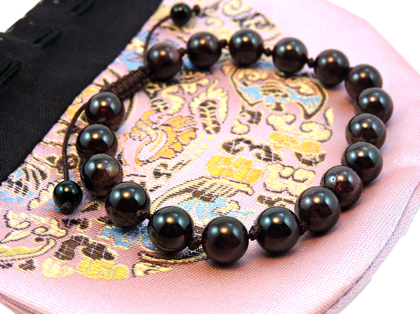 Tibetan individually knotted adjustable wrist mala bracelet Garnet brown cord