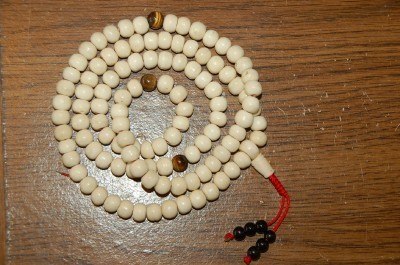 Yak bone mala with tiger eye spacers