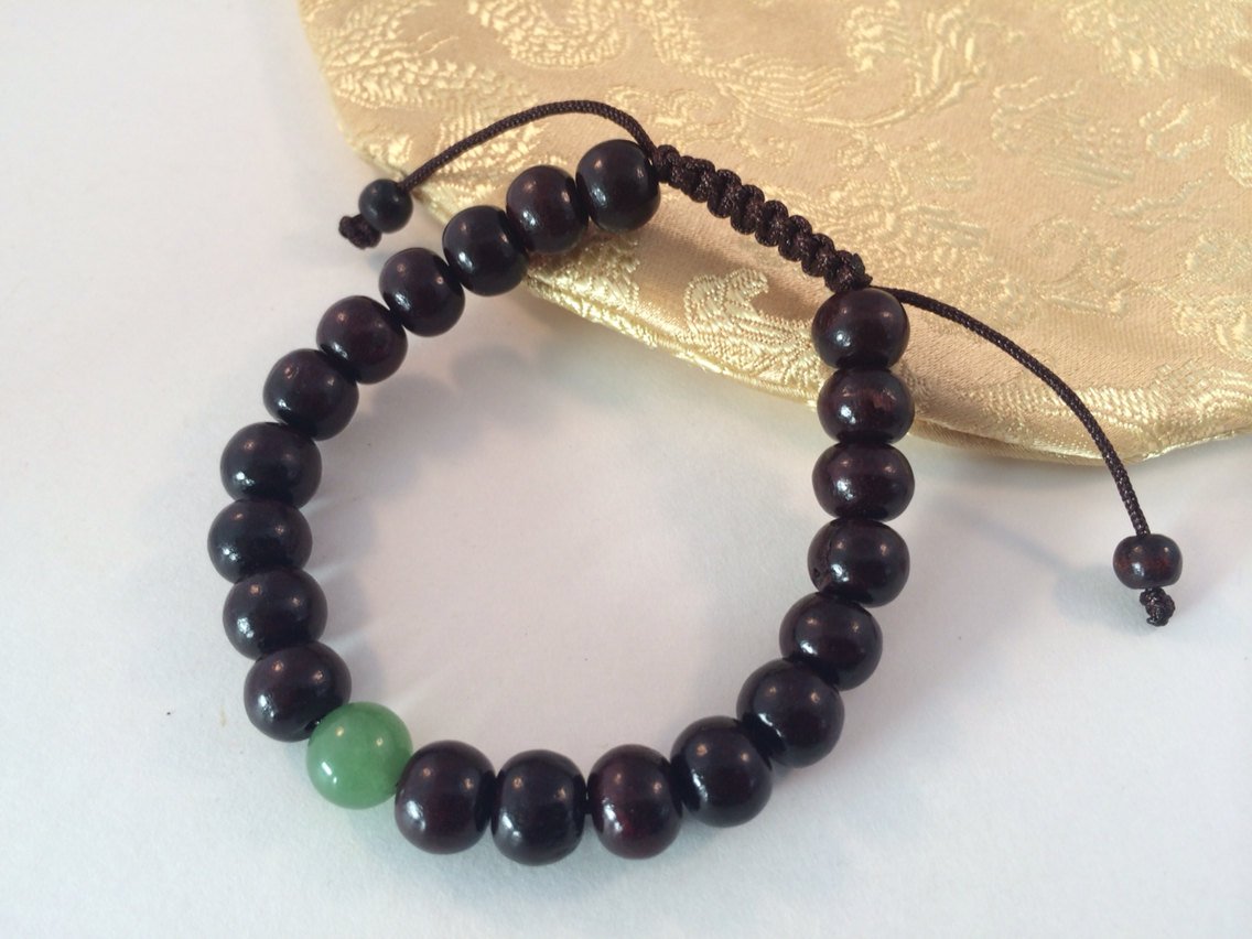 Dark Rosewood Tibetan Wrist Mala Bracelet with Green Jade Spacer