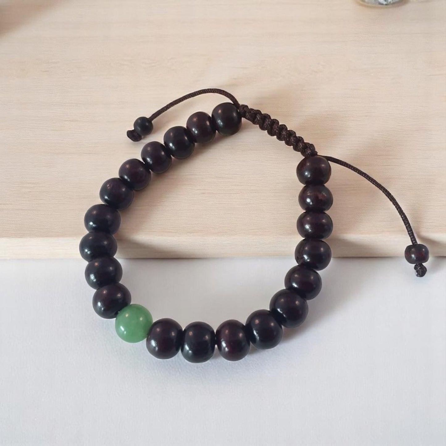 Dark Rosewood Tibetan Wrist Mala Bracelet with Green Jade Spacer