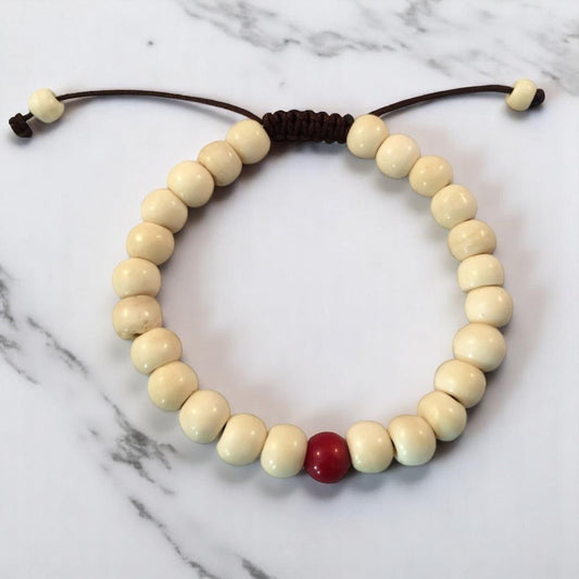 Yak Bone Wrist Mala Bracelet with Coral Spacer