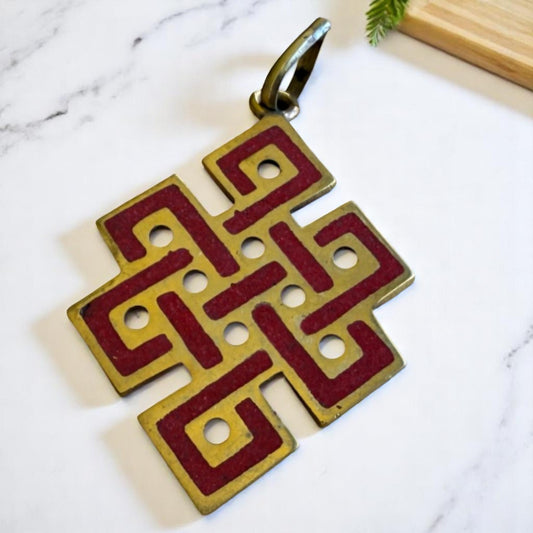 Hand Crafted Eternal Knot Coral and Brass Pendant