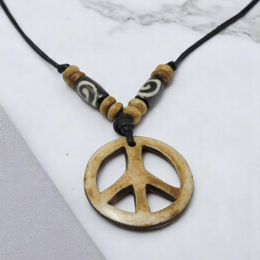 Hand Crafted Yak Bone Peace Pendant