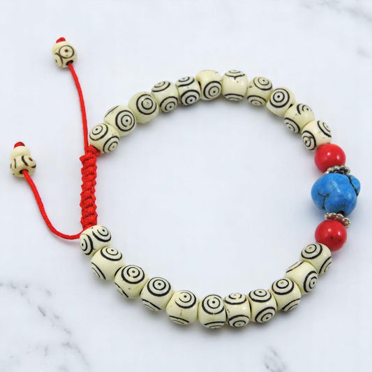 Carved Yak Bone Wrist Mala Bracelet with Turquoise and Coral Spacers