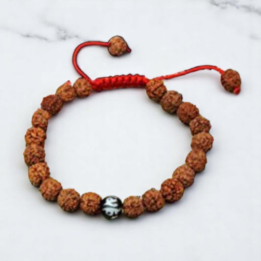 Hands Of Tibet Tibetan Mala Rudraksha Seed Wrist Mala Bracelet with Carved Om Mani Conch Shell Spacer Free Silk Pouch