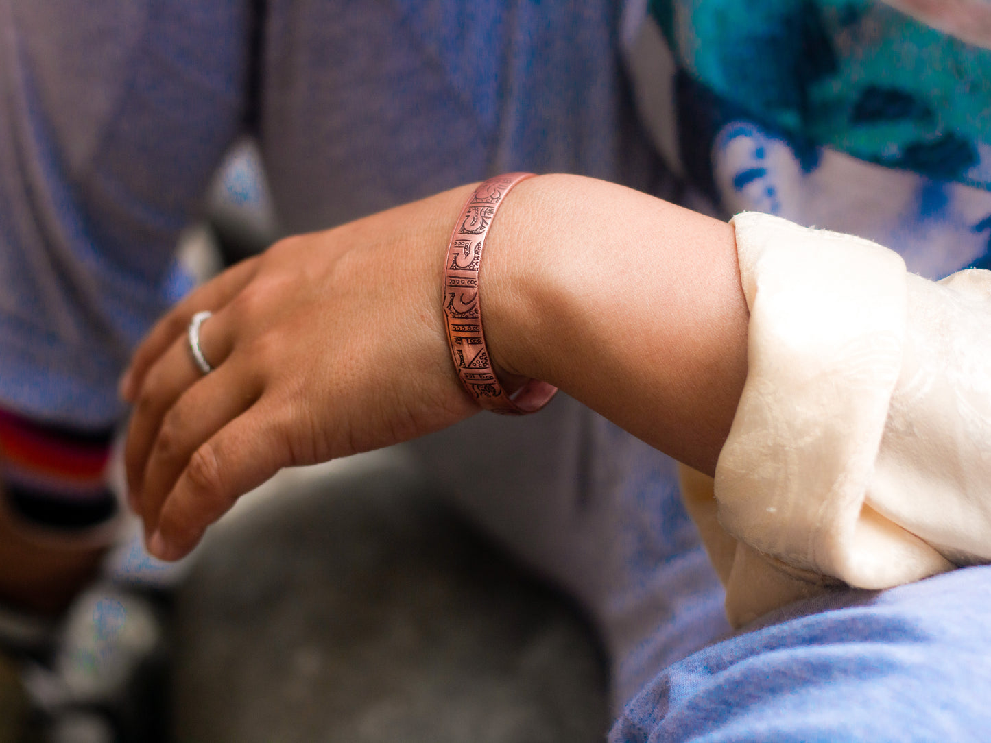 Buddha of Compassion Copper Bracelet