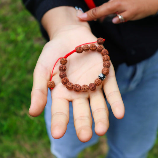 Hands Of Tibet Tibetan Mala Rudraksha Seed Wrist Mala Bracelet with Carved Om Mani Conch Shell Spacer Free Silk Pouch